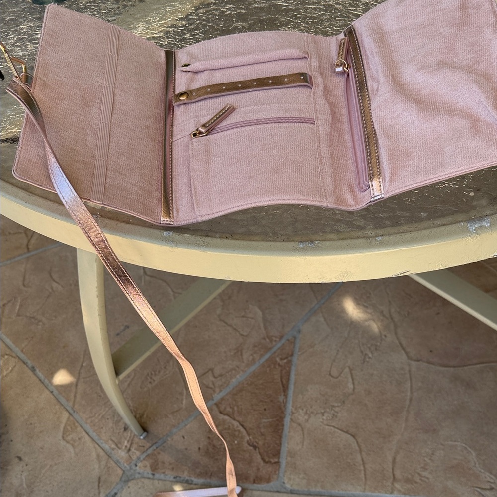 Neiman Marcus Blush Pink Cosmetic Bag or jewelry holder. One is pink and silver